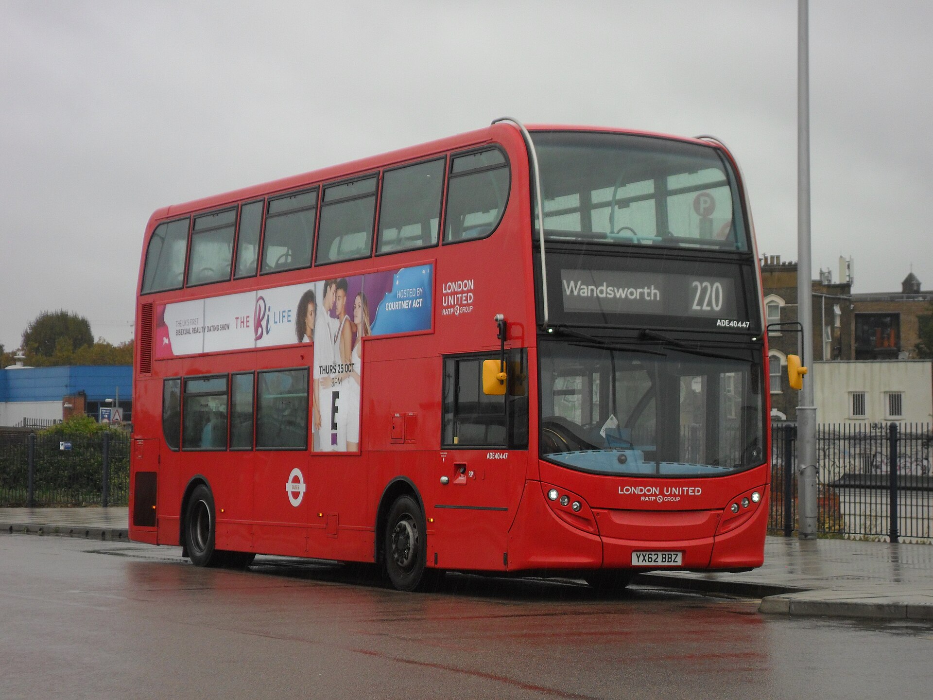 A modern Alexander Dennis Enviro400 low-floor double-decker bus in London United livery at Willesden Junction on route 220.