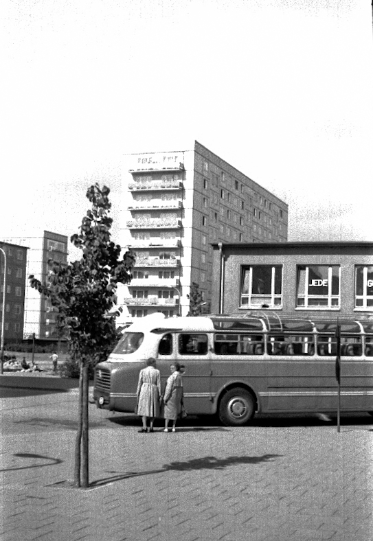 A rounded, streamlined Ikarus 55 coach on a street in East Berlin in 1967