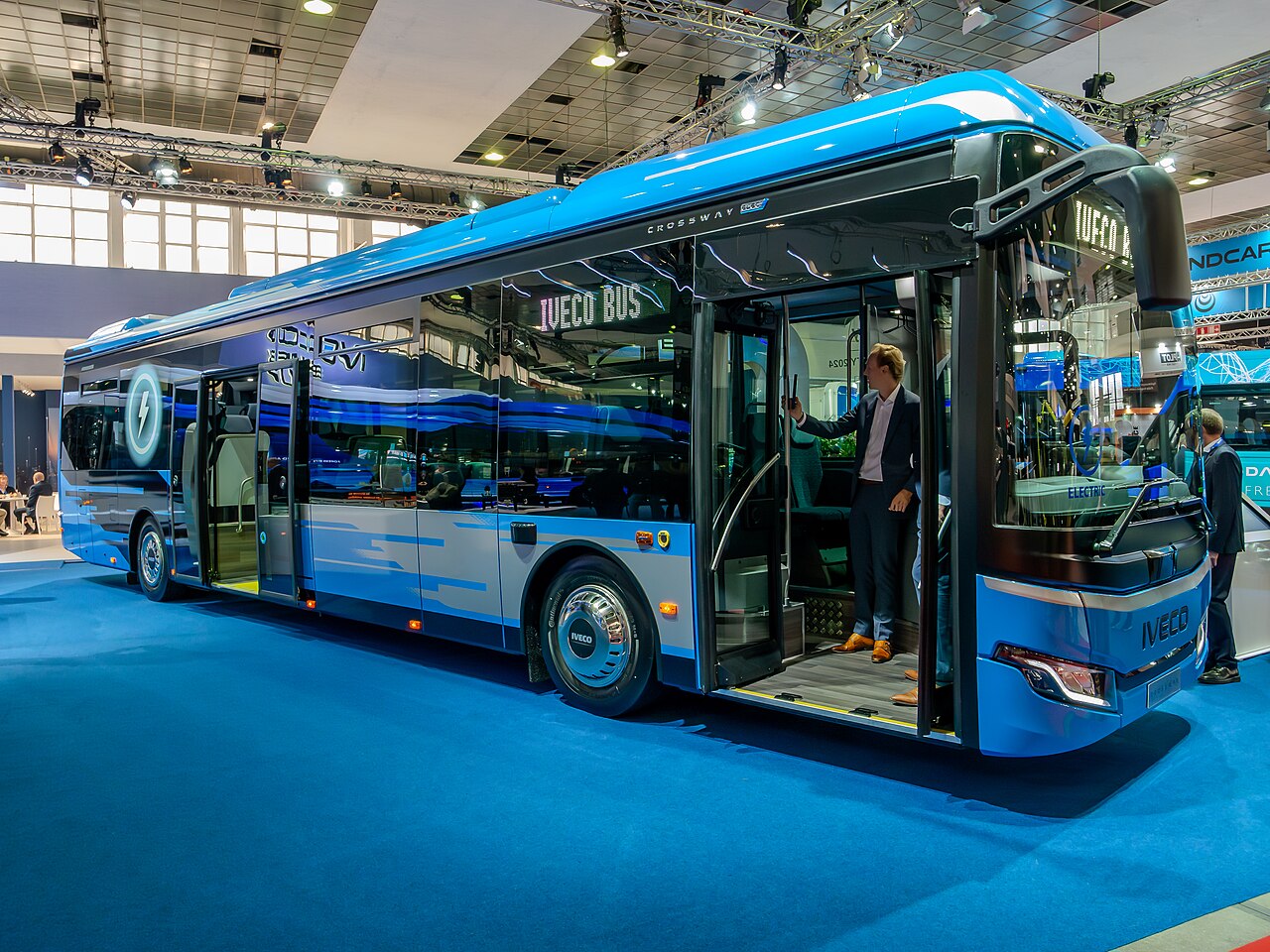 An electric Iveco Crossway LE Elec bus on display at Busworld Europe 2023 in Brussels.
