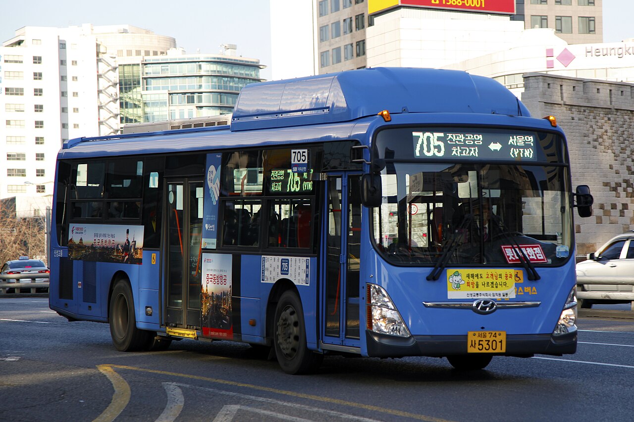 A Hyundai Super Aero City low-entrance city bus on route 705 on Namdaemun Road, Seoul