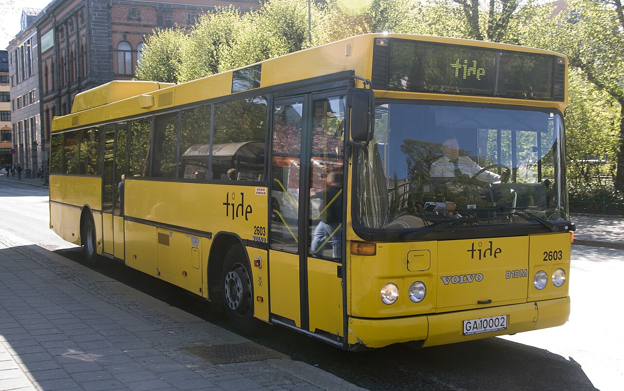 A Volvo B10M city bus with Carrus body in CNG livery at Bergen, Norway