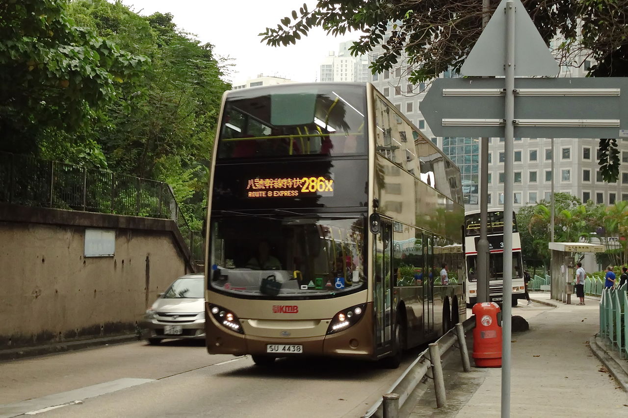A Kowloon Motor Bus Alexander Dennis Enviro500 three-axle double-decker on Castle Peak Road in Hong Kong