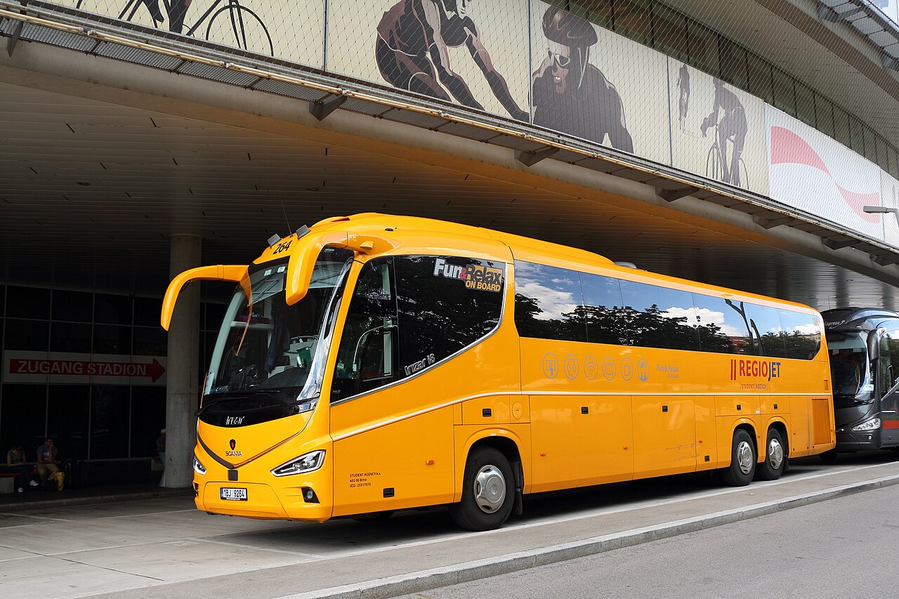 An Irizar i8 premium touring coach in Student Agency livery in Vienna.