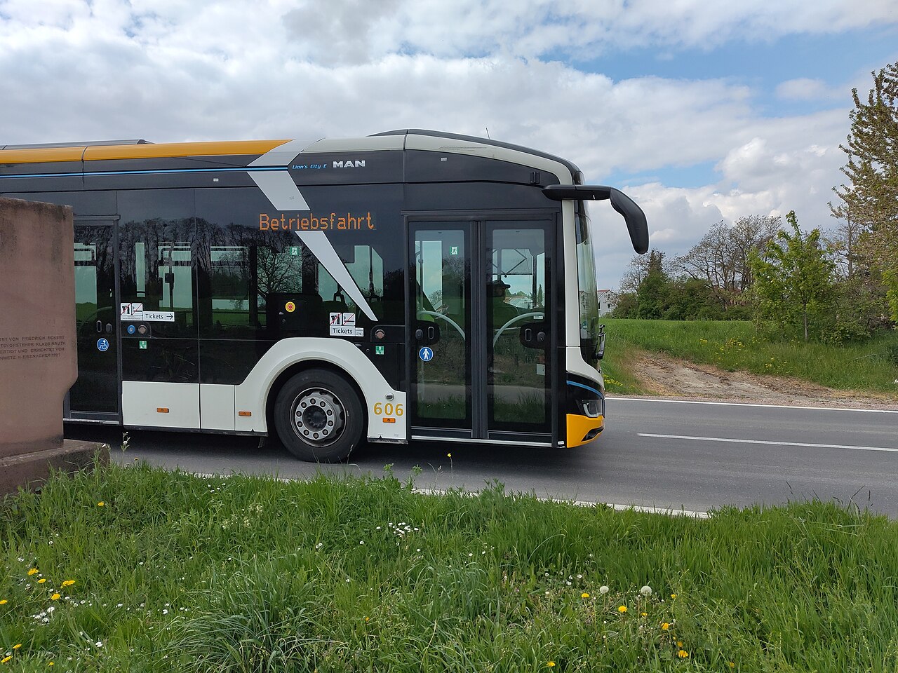 A modern MAN Lion's City E electric city bus on a test run near Mainz, Germany