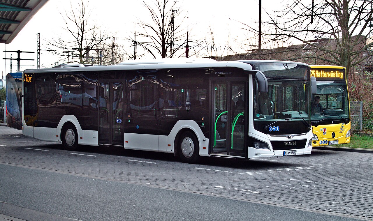 A second-generation MAN Lion's City city bus, type A37, at a bus station in Oldenburg, Germany