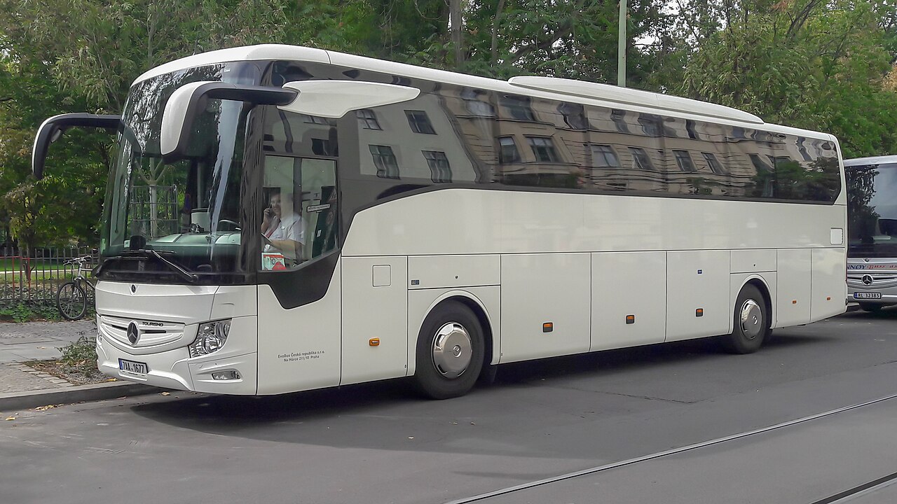 A Mercedes-Benz Tourismo high-deck touring coach.