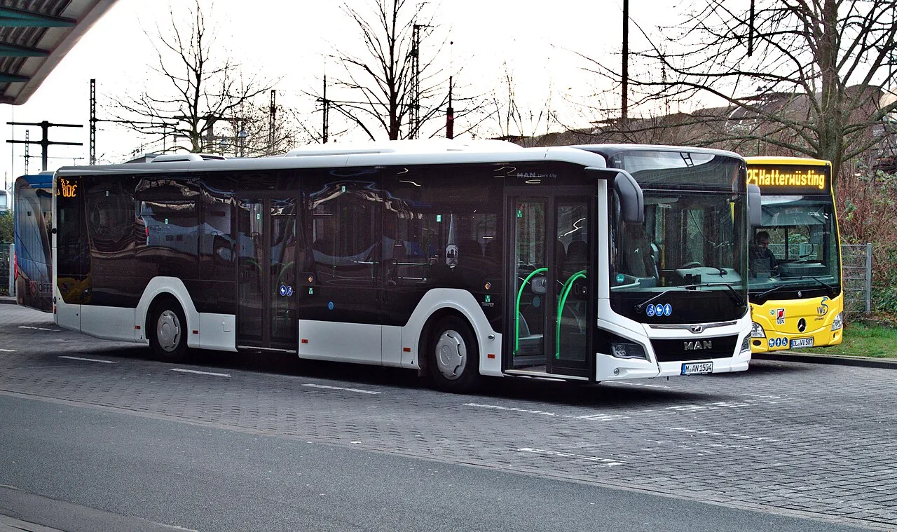 A modern MAN Lion's City low-floor city bus at the central bus station in Oldenburg, Germany.