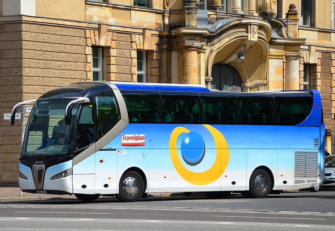 A Noge Titanium coach on a MAN 18.440 chassis, parked on a street in Berlin-Mitte.