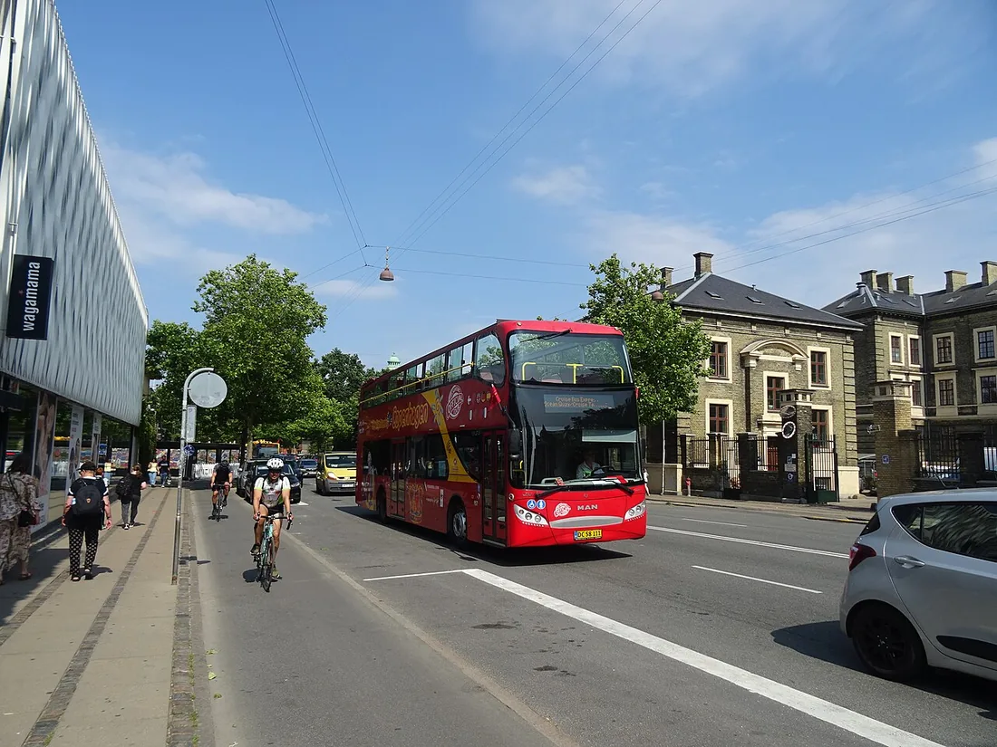A City Sightseeing open-top double-decker with UNVI Urbis 2.5 DD bodywork, on Tietgensgade in Copenhagen.