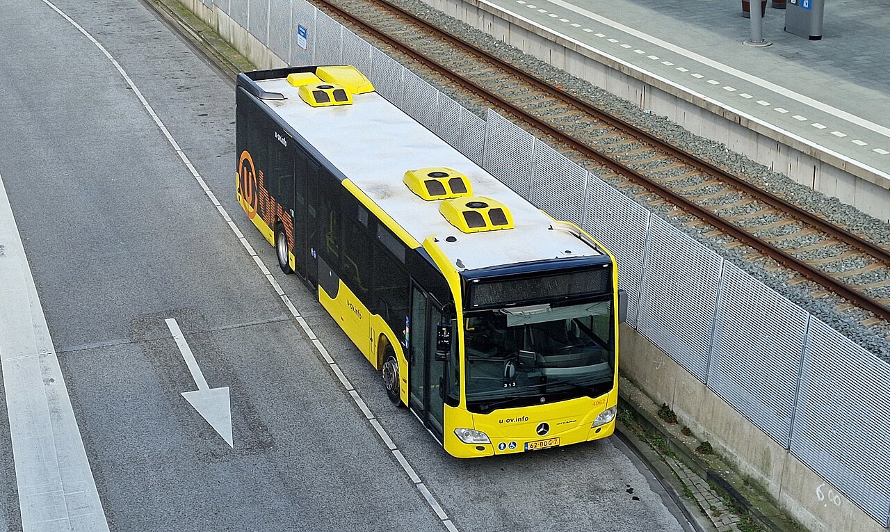 A Mercedes-Benz Citaro city bus showing its multiple passenger doors along the side
