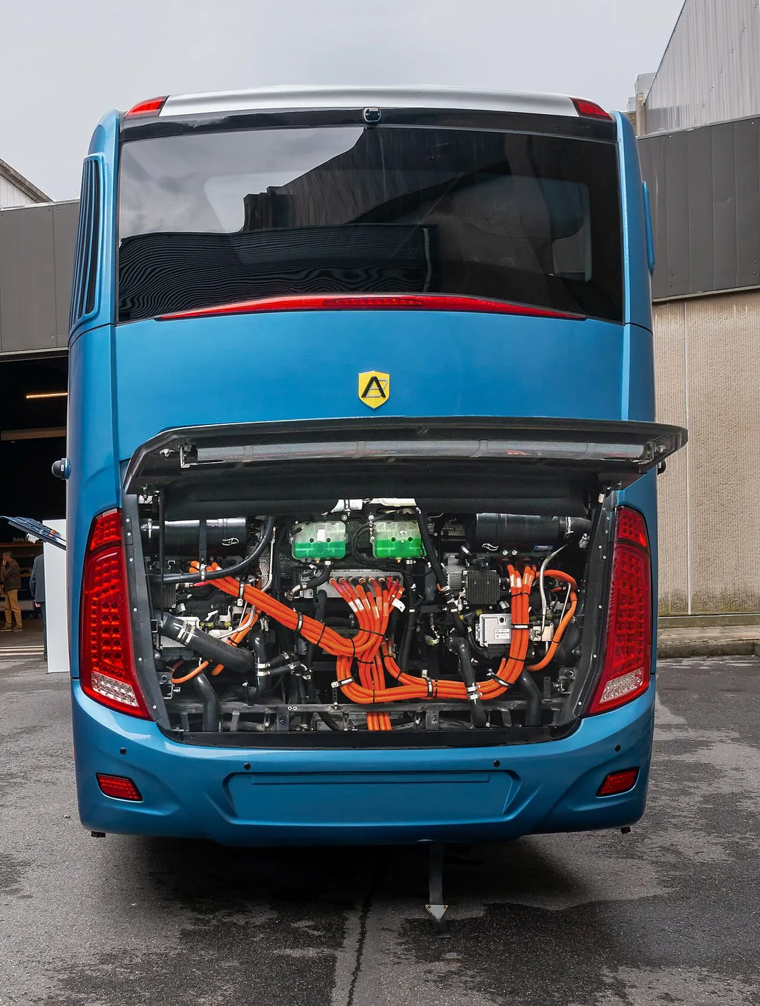A modern Marcopolo Audace coach on display, a typical air-braked long-distance bus.